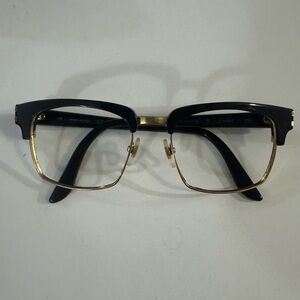 Cartier Black and Gold Frame Glasses
